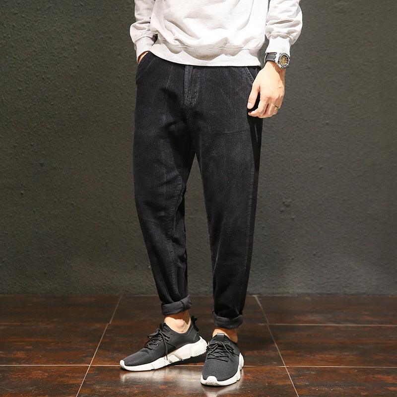 Men's cropped black trousers, relaxed straight fit, cuffed ankles, side pockets