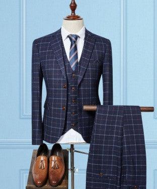 Dark navy plaid men's business suit: jacket, matching vest, and trousers