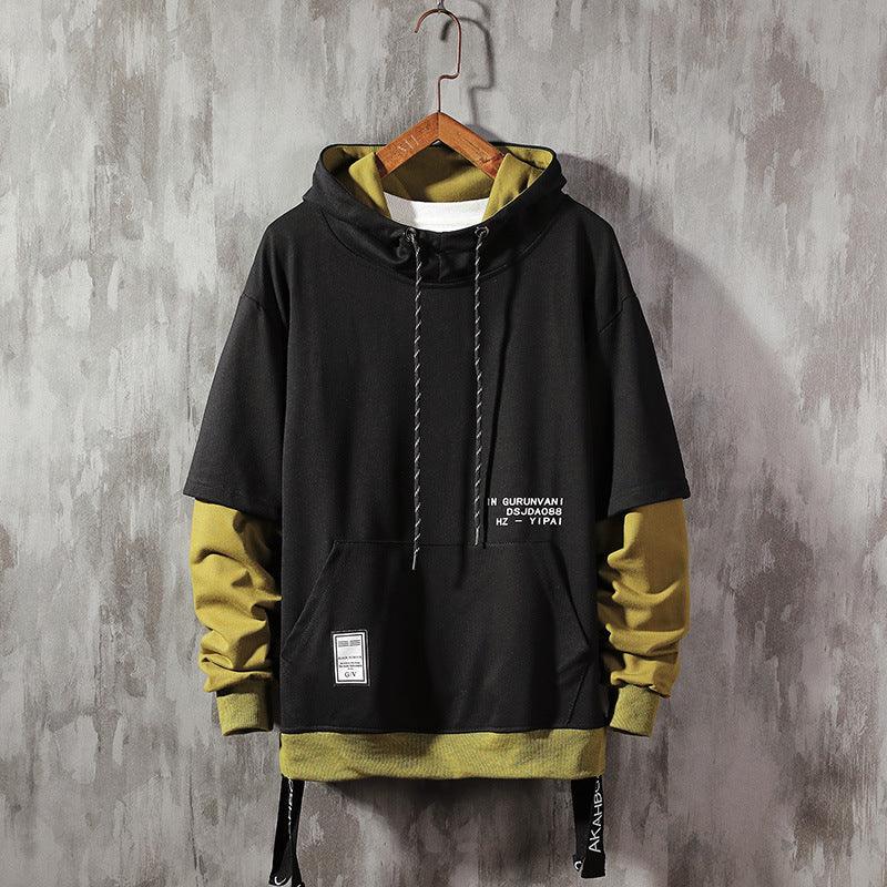 Boys' black hooded sweater coat with yellow sleeves, front pocket, and braided drawstrings