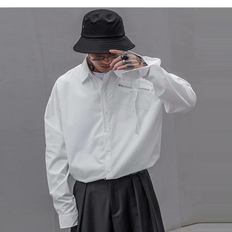 Men's loose white long-sleeve button-up shirt with chest pocket