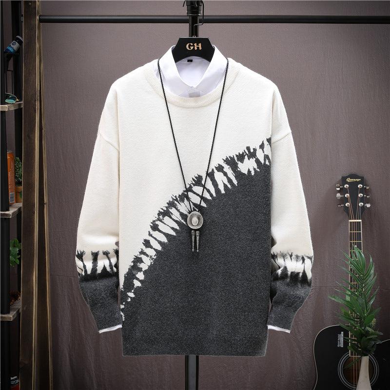 White winter sweater with diagonal black streak graphic, crew neck, long sleeves