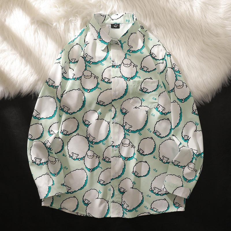 Light green button-up shirt with white sheep print, long sleeves, collared neckline