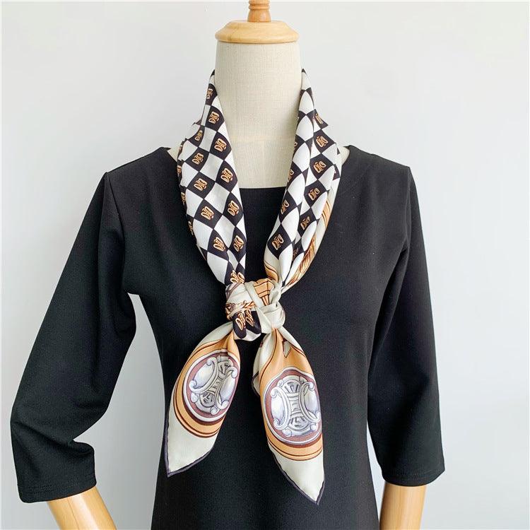 Square scarf shawl in black with horse-and-carriage border and checkered center, tied