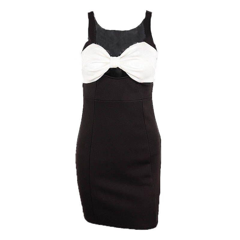 Black suspender mini dress on white background with white bow bust detail