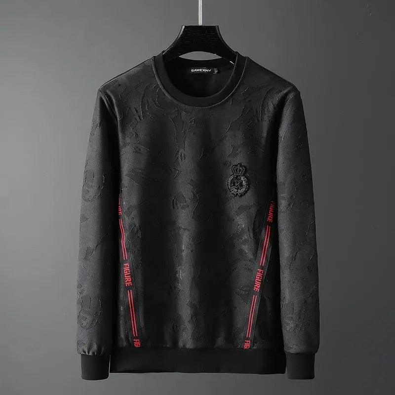Black round-neck sweater with textured finish, chest emblem, and red side stripe accents