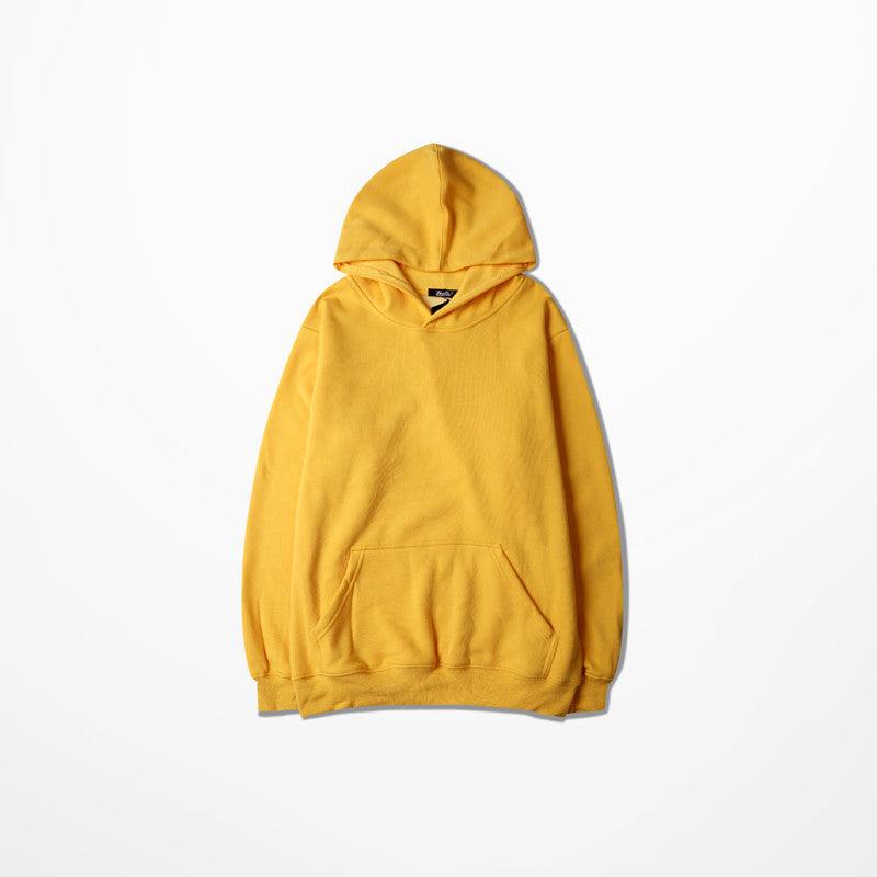 Men's hooded sweatshirt in mustard yellow with front kangaroo pocket and pullover hood.