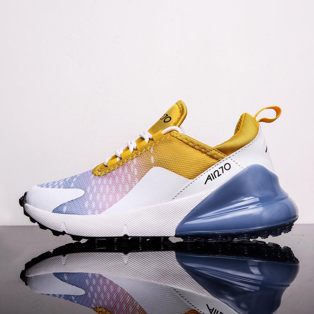 Angled pair of yellow air-cushion sneakers with white side panels and blue heel