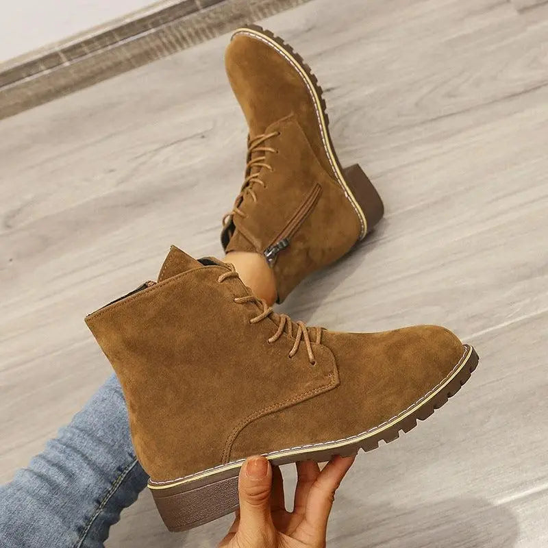 Women’s tan suede lace-up ankle boots with side zipper and contrast sole trim