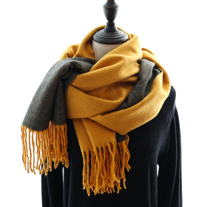 Warm cashmere scarf with mustard yellow, charcoal grey, and long fringes.