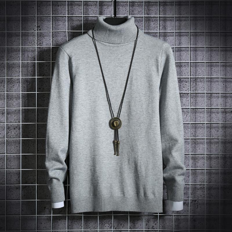 Men's turtleneck sweater in grey knit with long sleeves and ribbed neckline and cuffs.