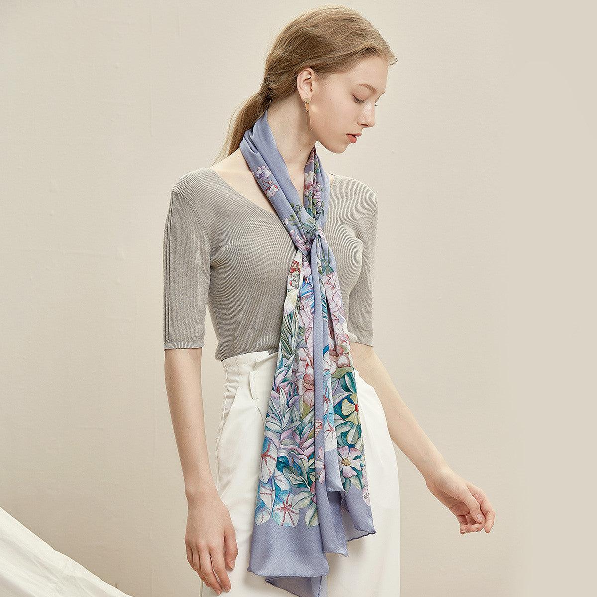 Silk scarf in dusty blue with colorful butterfly and floral illustration print, long ends