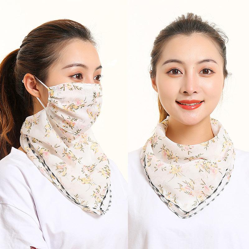 Ivory floral bib scarf with matching face covering, draped around neck