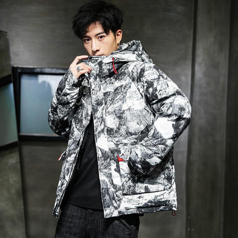 Printed cotton jacket with hood, black-and-white abstract pattern, red drawstrings, front zipper.