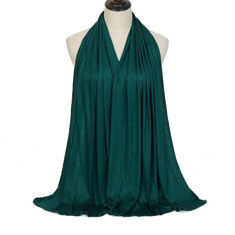 Dark teal ladies mercerized cotton headscarf with pleated drape and soft fringe hem