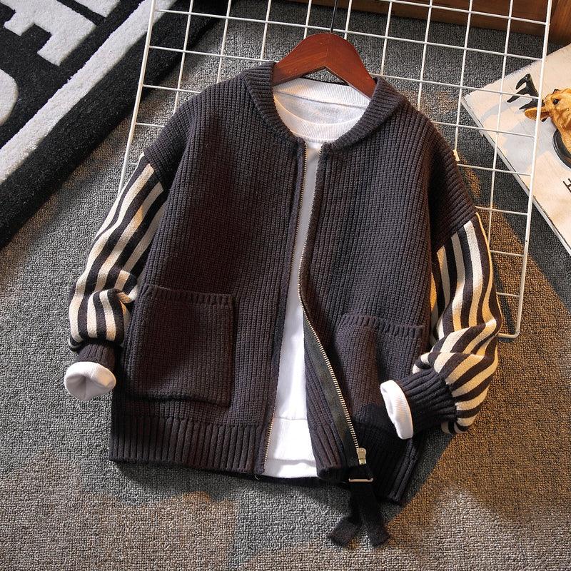 Boys dark grey knit cardigan sweater with front pockets and striped cuffs, full zip