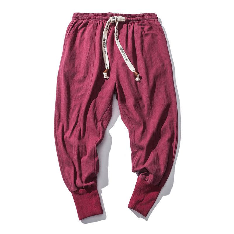 Men's wine red cotton drawstring pants with ribbed cuffs and tapered legs