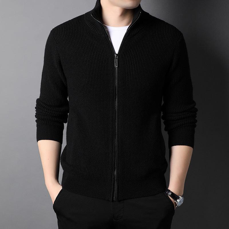 Black knit sweater coat with full front zipper and ribbed cuffs, stand collar
