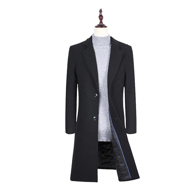 Men's black wool trench coat open at front, showing quilted inner lining