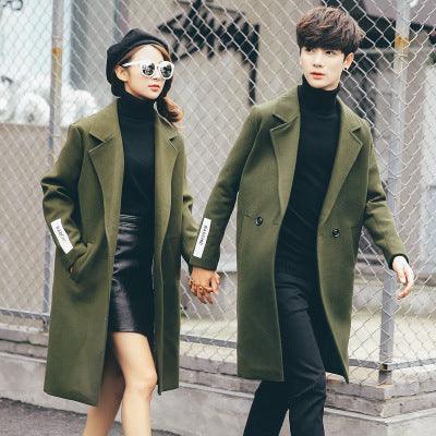 Men's army green wool trench coat with notched lapels and buttoned front, long length.