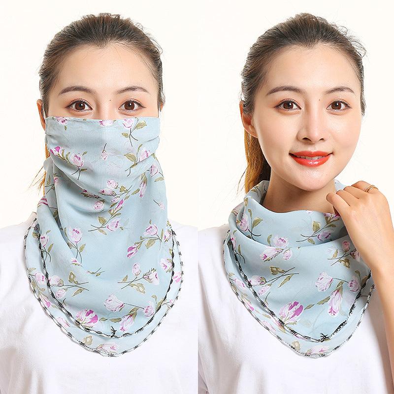 Women’s silk scarf, light blue floral print with black trim edge