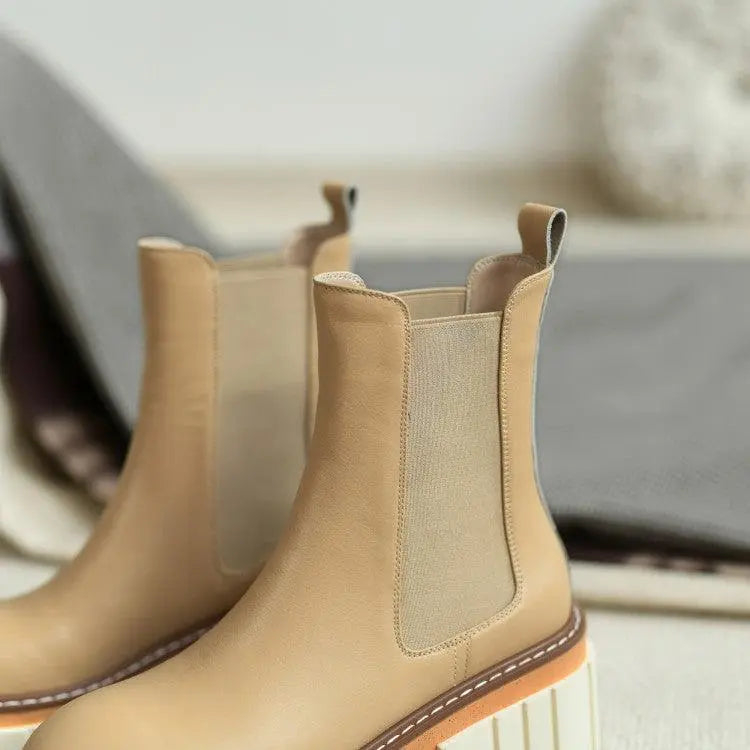 Tan ankle boots with elastic side panels and cushioned chunky platform sole