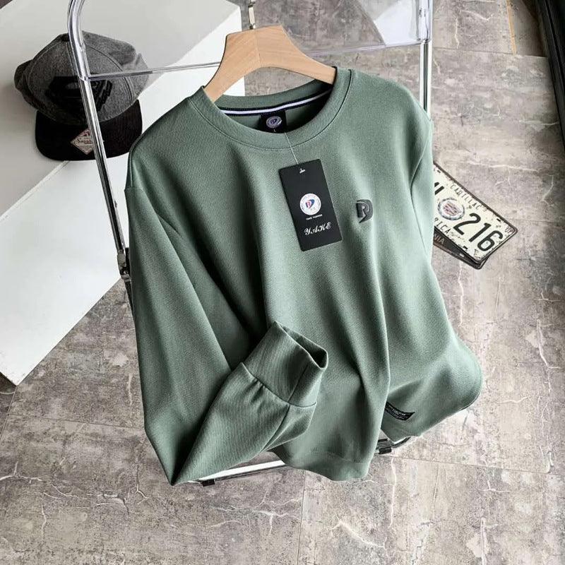 Green long-sleeve pullover base shirt with crew neck, kangaroo pocket, and chest logo tag.