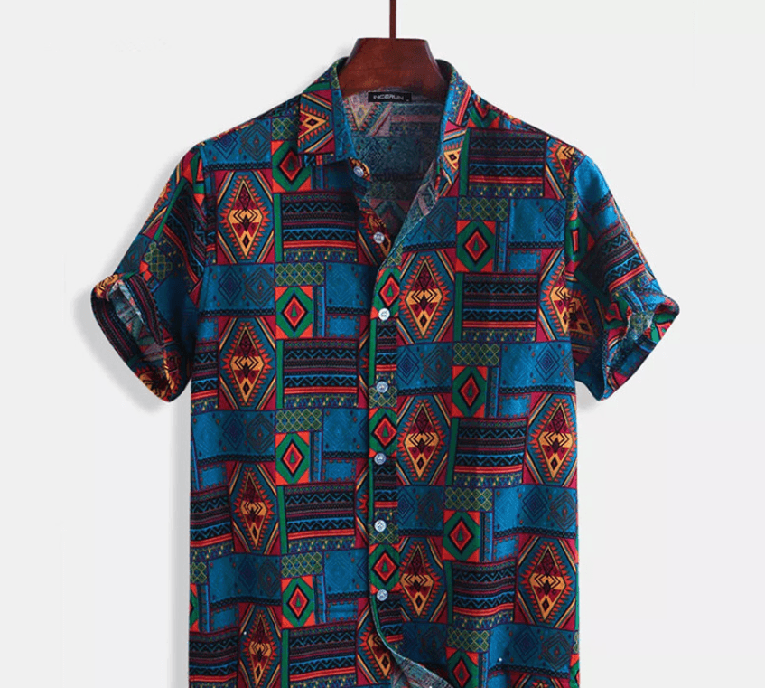Men's printed shirt, front view, navy blue geometric pattern with multicolor diamond motifs