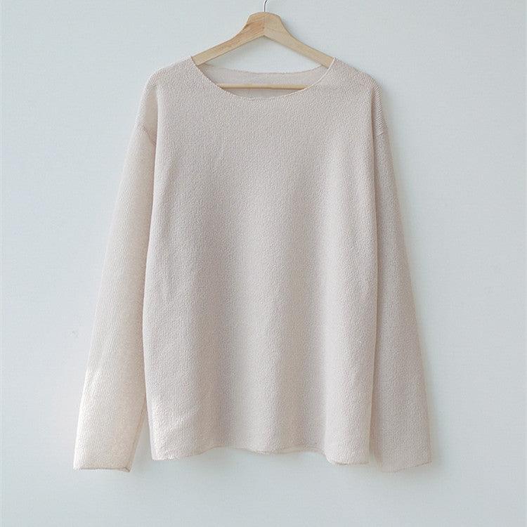 Beige long-sleeve T-shirt on wooden hanger, crew neck, relaxed fit