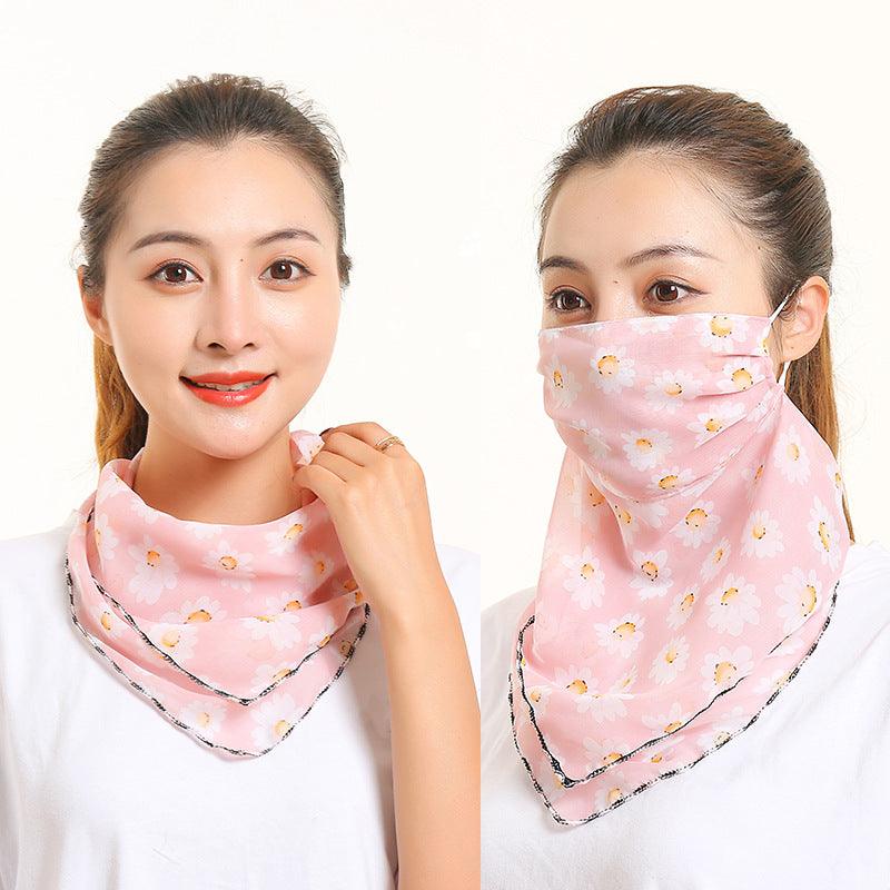 Floral silk neck scarf with face covering, soft pink base with daisy-like blossoms and trim