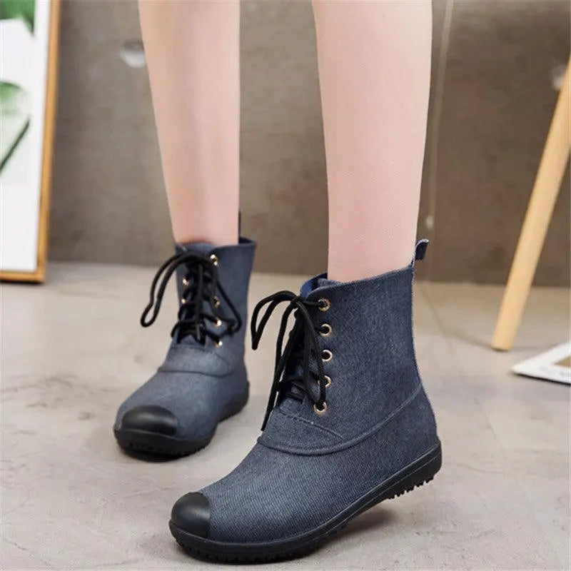 Waterproof lace-up Martin boots in dark blue with black rubber toe cap