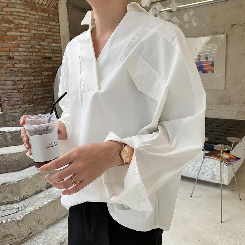 White long-sleeve casual shirt with V-neck and chest pocket, relaxed fit