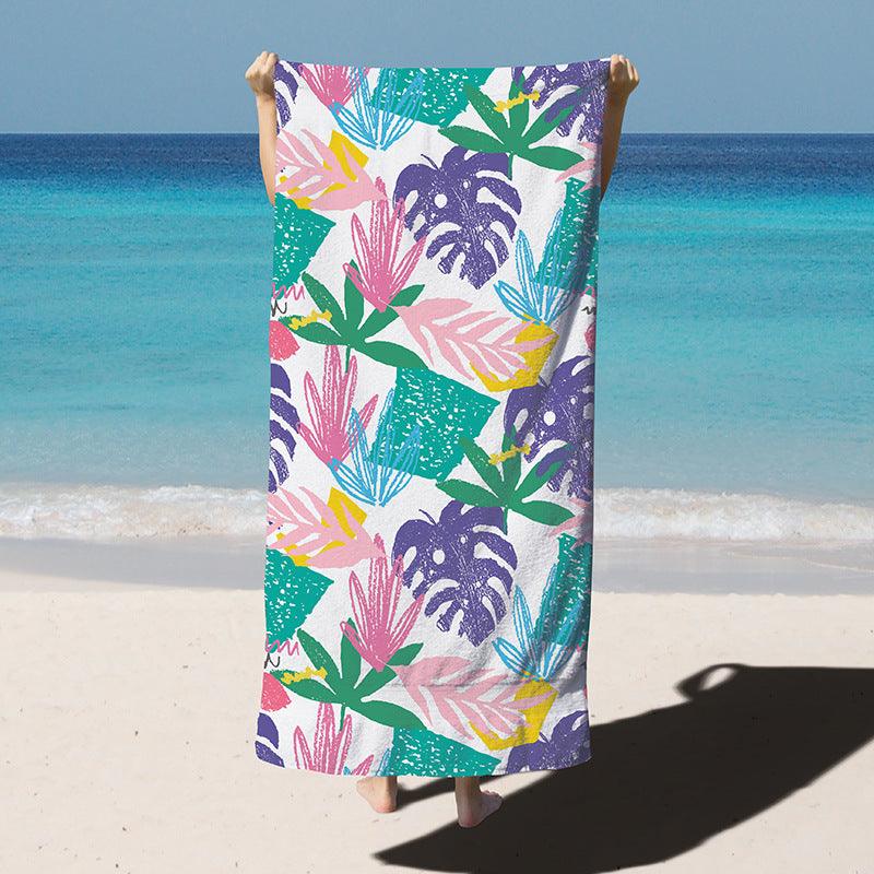 Quick-drying microfiber bath towel with purple and teal tropical foliage pattern