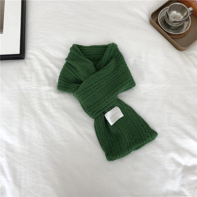 Thick knit cashmere scarf, green cross-wrap, ribbed knit texture