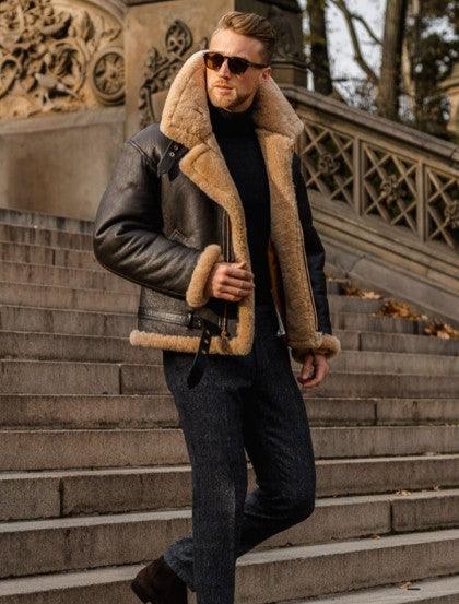 Men's dark brown long-sleeve coat with tan shearling collar and trim