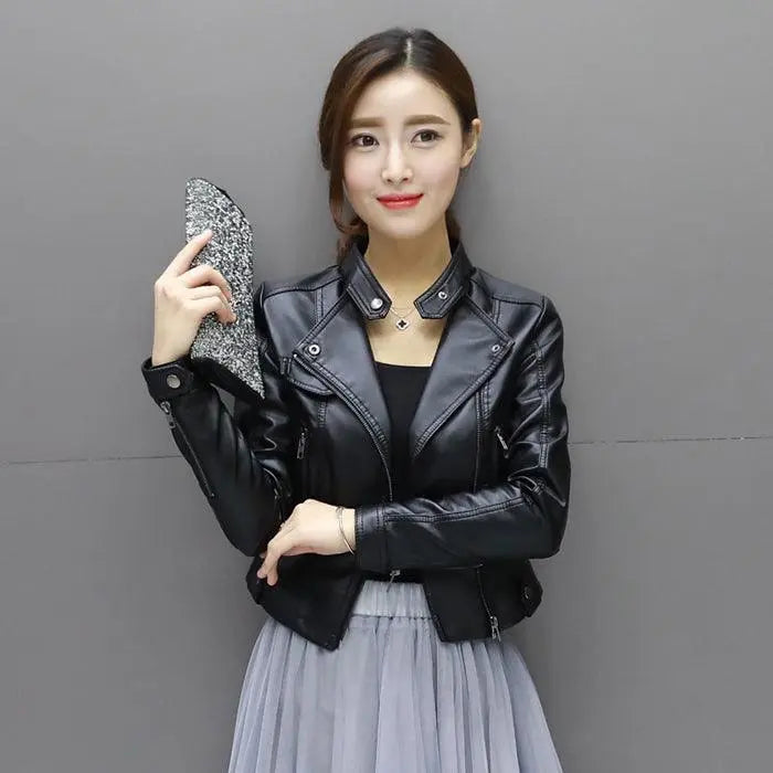 Black slim zipper jacket with snap collar and buttoned cuffs