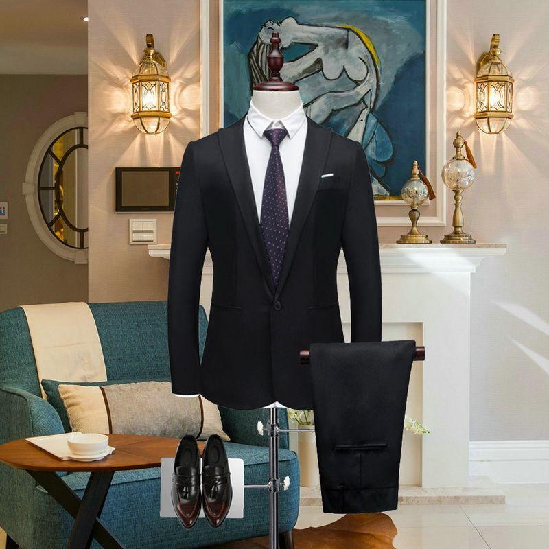 Black single-breasted blazer jacket with matching trousers on a mannequin