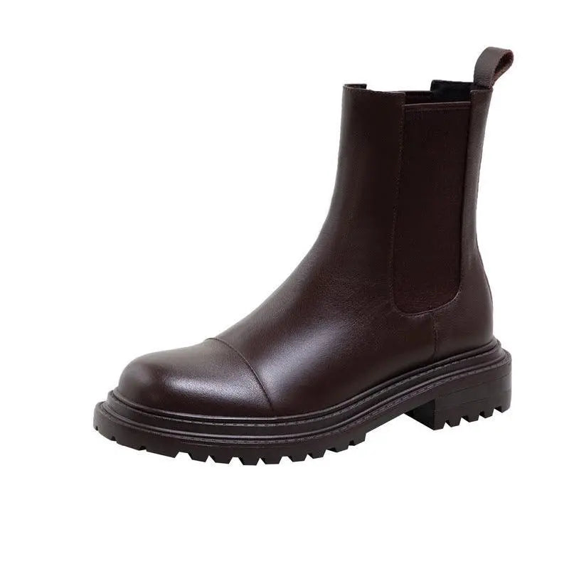 Brown platform Chelsea boot with elastic side gore and thick dark lug sole
