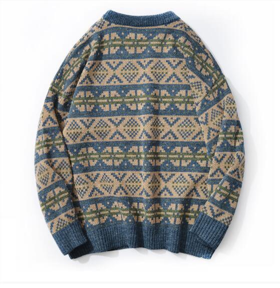 Loose knitted sweater in blue, green, and tan fair isle pattern