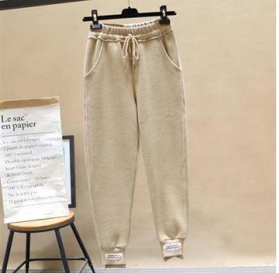 Light khaki harem jogger trousers with elastic waistband and drawstring, cuffed hem