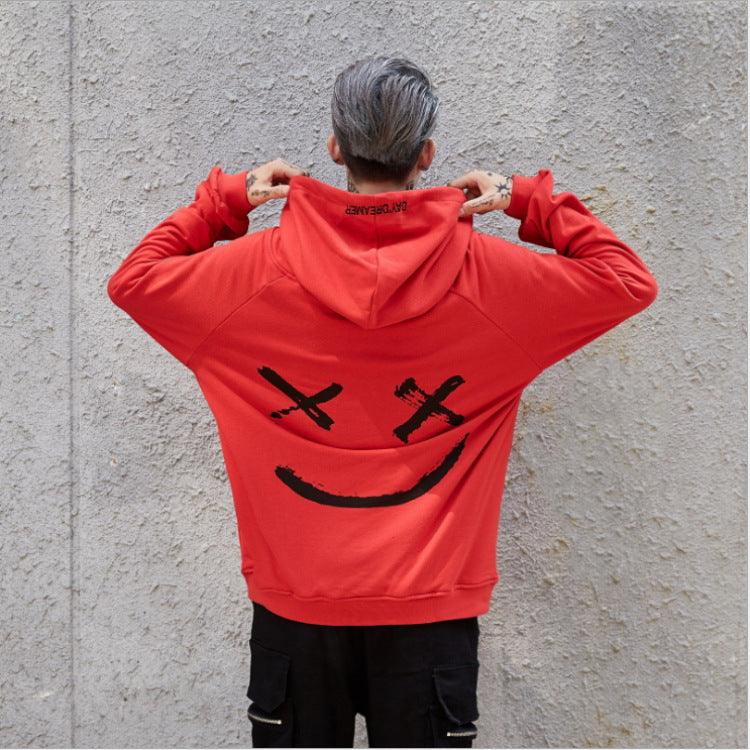 Color-blocking hoodie sweater with hood and smiley graphic, red back panel