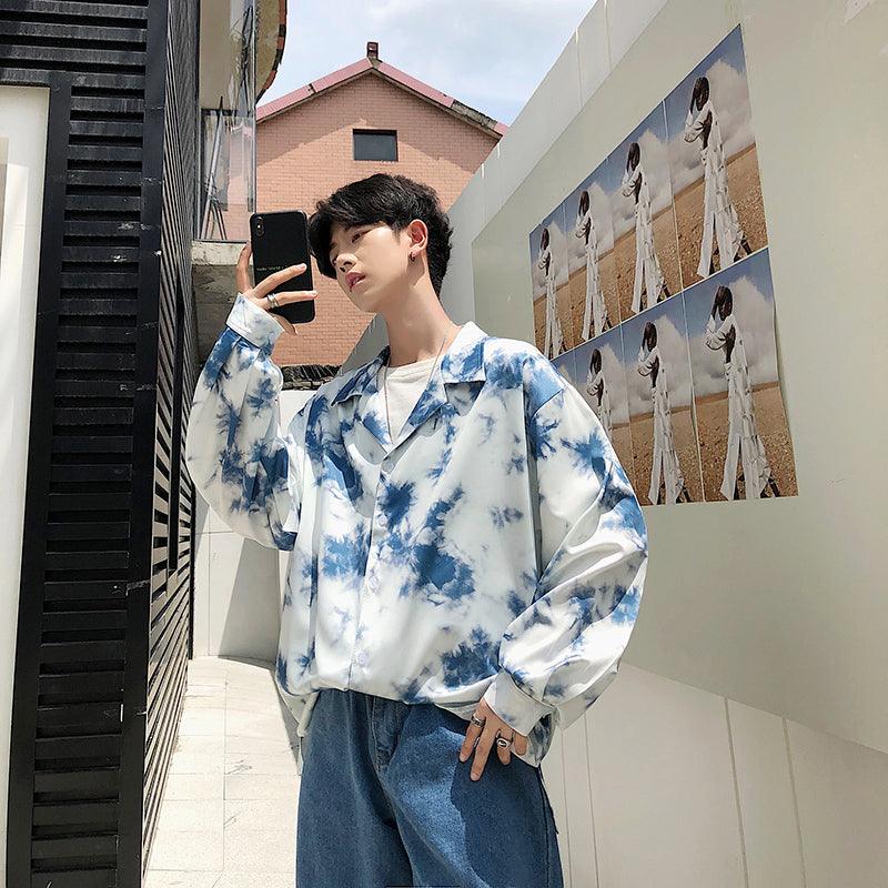 Loose long-sleeved shirt in blue-and-white tie-dye, open collar with button placket