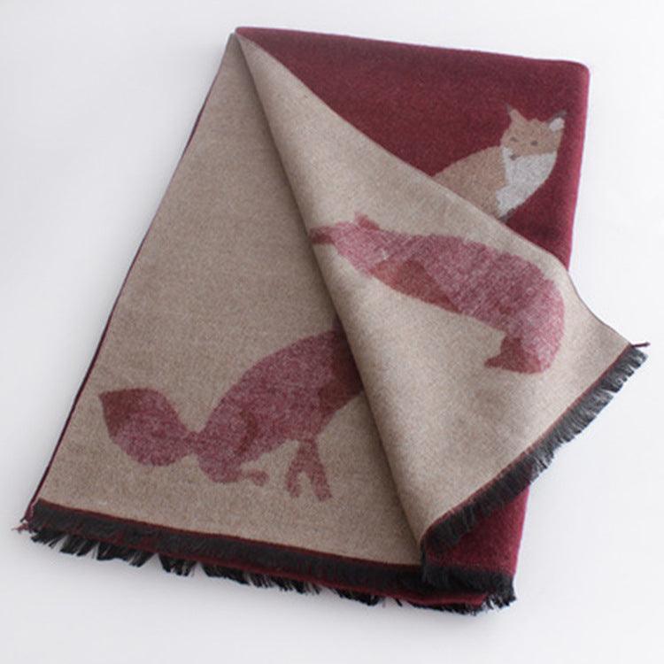 Thick warm jacquard scarf in beige and maroon with fox silhouettes, fringed ends