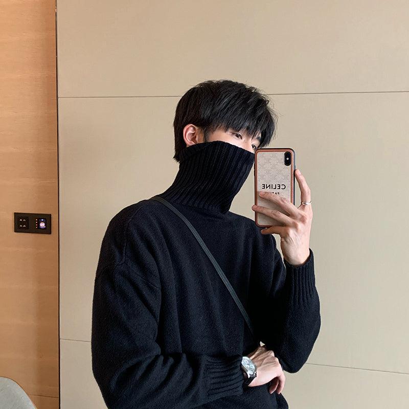 Men's black ribbed turtleneck knit sweater with long sleeves