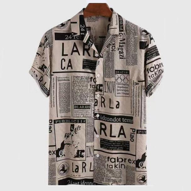 Men's Hawaiian shirt in light beige with black typographic blocks, short sleeves.
