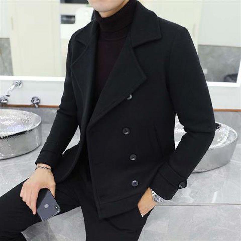 Black wool trench coat, double-breasted buttons, notch lapels, flap pockets