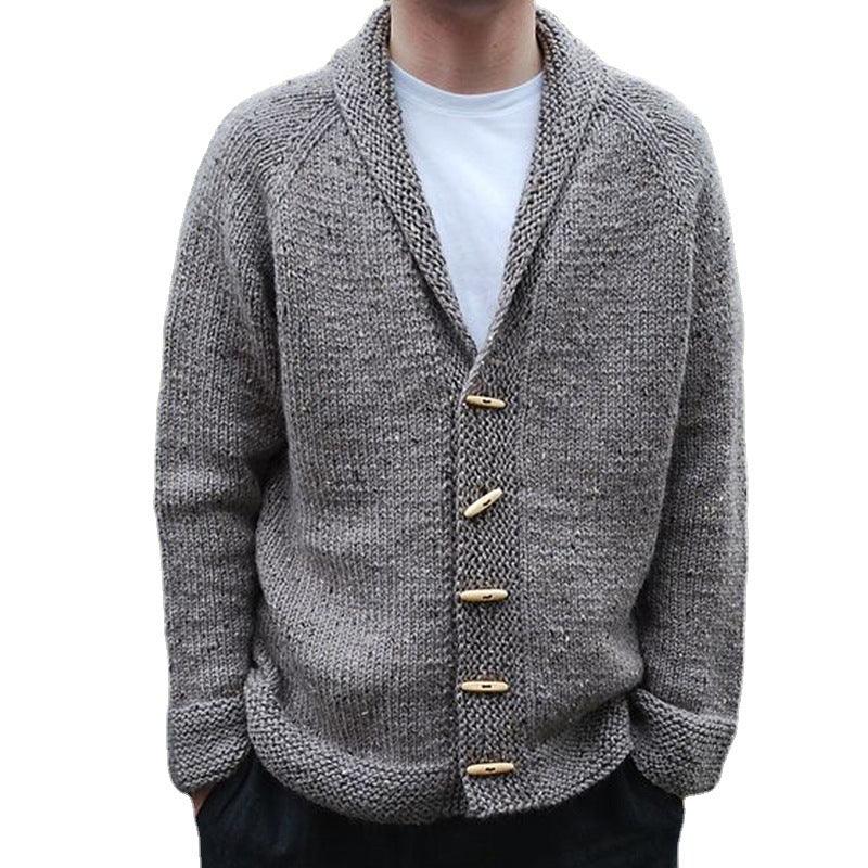 Grey knit cardigan sweater with long sleeves, shawl collar, button placket