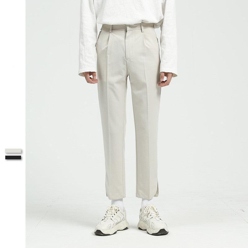 Men's off-white suit trousers with pleated front, belt loops, straight leg