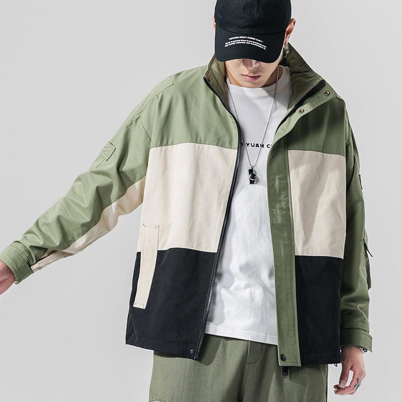 Color-block casual jacket: olive, cream, and dark navy with zip front and pockets