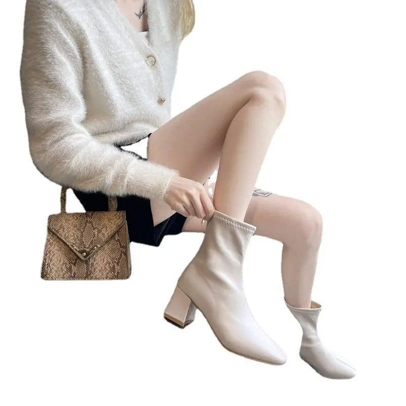 Soft leather white ankle boots with chunky block heel and pull-on shaft