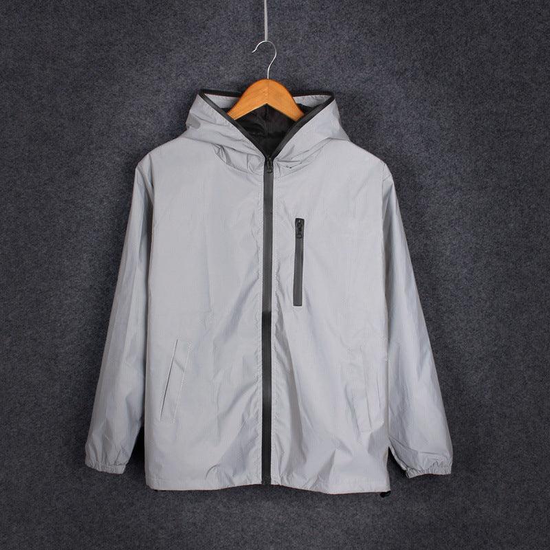 Light grey hooded windbreaker jacket with full zipper and two zip pockets